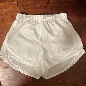 Nike Dri-FIT tempo shorts in white (XS)